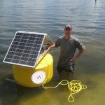 AltE customer prepares a buoy for deployment to the Arctic