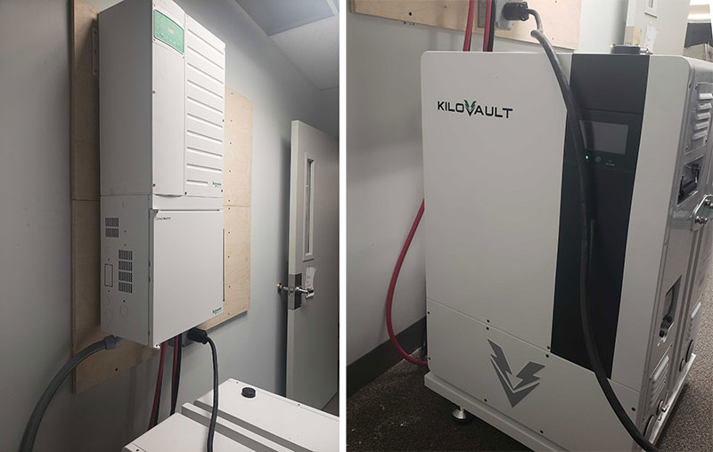 a Schneider XW Pro inverter on the left and two KiloVault HAB lithium solar batteries on the right